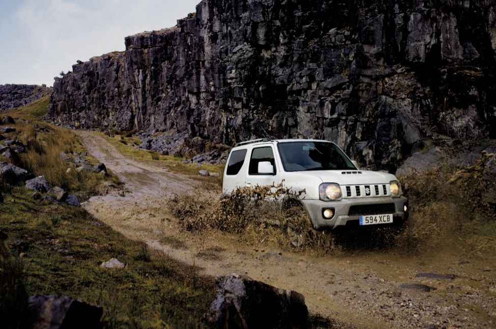 Jimny Adventure driving through the mud